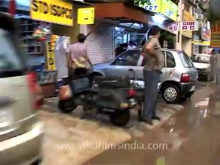2731.Water clogged Delhi streets during monsoons