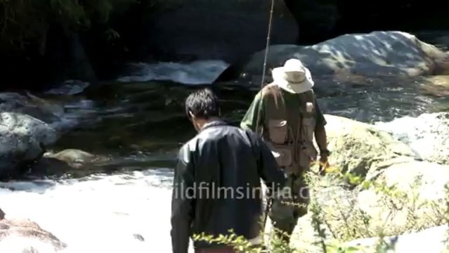 2908.Angling for trout in the Himalaya