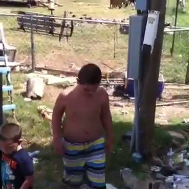 Grandsons working in my back yard. 08/20/2013