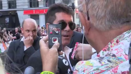 Simon Cowell is very excited to be a dad - One Direction Premiere