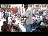 Hundreds of Muslim devotees performing Iftar at Nizamuddin Dargah