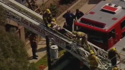 Burglar stuck in chimney is rescued