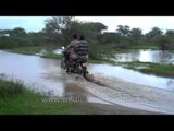 Bike crosses flood in Slow motion: Sonkhaliya monsoon
