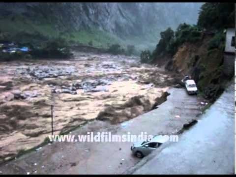 The swirling waters carry away cars like they are toys: Uttarakhand floods