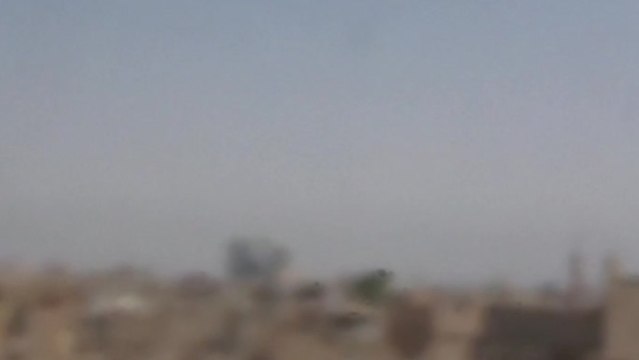 Syrian rebels celebrate after shooting down military jet