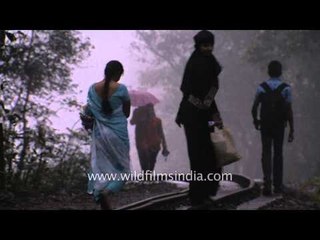 People walking on railway tracks of Matheran