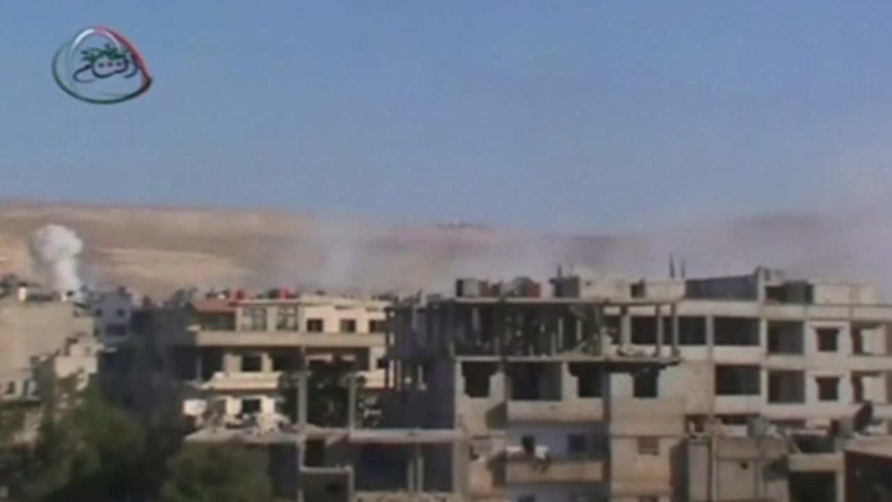 Shelling rocks Damascus suburbs as U.N. inspections continue