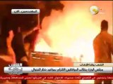 عناصر من الإخوان يشعلون النار بأحد السيارات في شارع جامعة الدول العربية