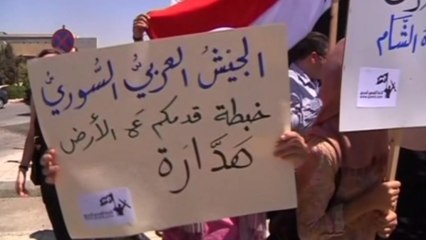 Protesters against U.S. military intervention cry "Hands off Syria" internationally