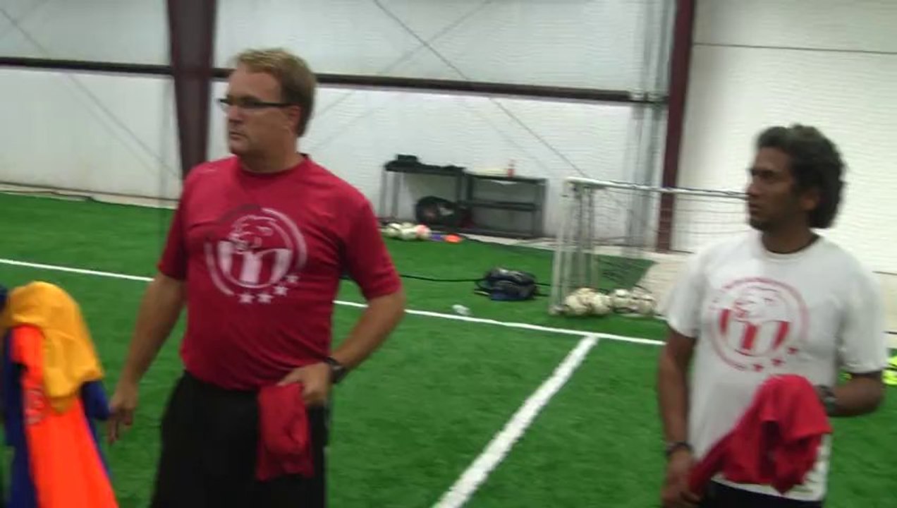00036 peterson with coach shek from the haitian women team