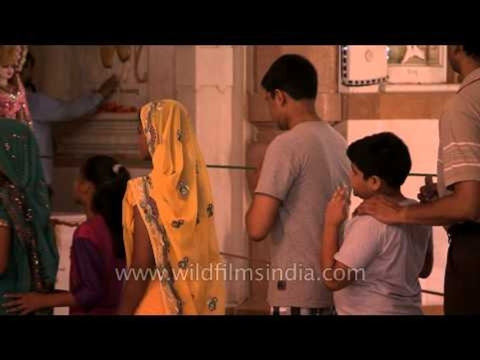 Believers looking at the camera at Birla Mandir