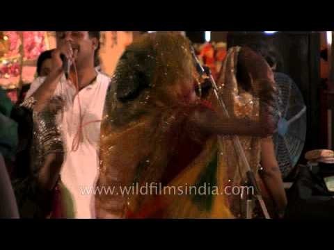 Devotees singing Bhajans and dancing Raas Leela on Janmashtami