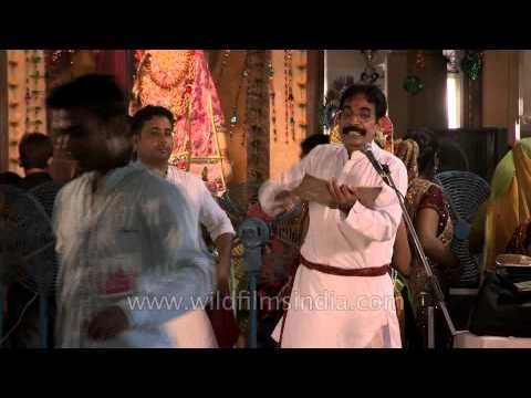 Spiritual leader singing Sri Krishna bhajans on Janmashtami