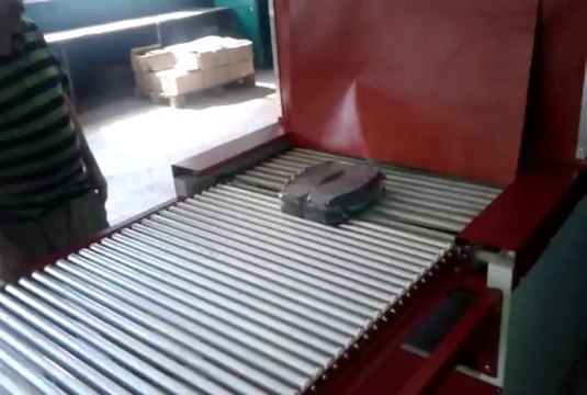 semi-automatic shrink packaging machine