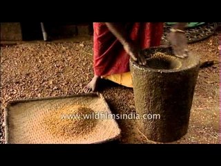 Traditional process of husking rice - South India