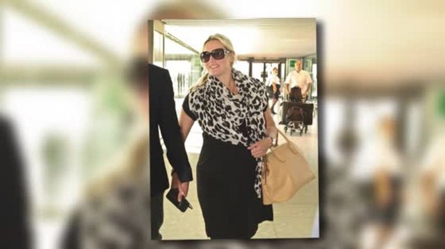 Pregnant Kate Winslet Protects Her Baby Bump With Ned Rocknroll