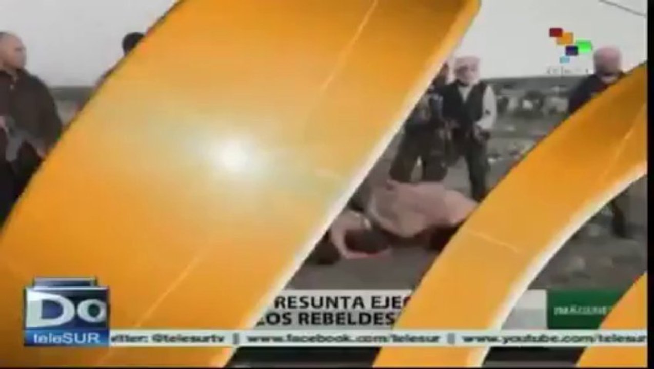 Imágenes de una ejecución de soldados sirios por rebeldes sirios