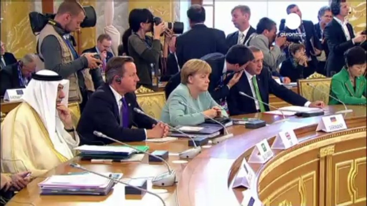 G20 ends with Barack Obama and Vladimir Putin sticking...