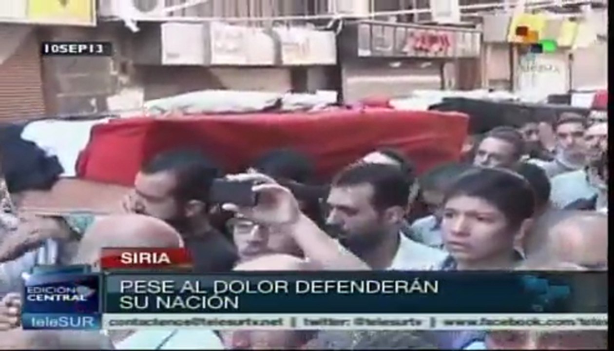 Sirios dispuestos a defender su patria y apoyar a su gobierno