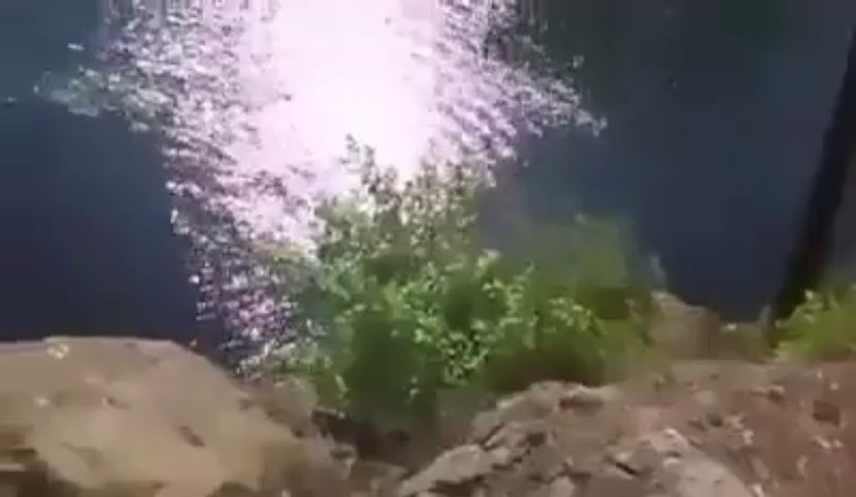 OMG!!!! Big Fail Jumping off cliff and hits rocks.