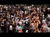 People gather from nearby villages to play stone throwing festival