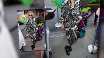 Rita Ora Wows in a Sign-Print Suit After Closing DKNY Show