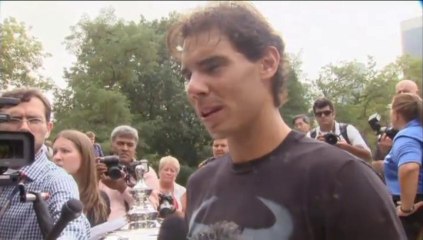 Rafael Nadal with the US Open Championship trophy at Central Park in NYC.