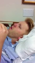 Waking up from surgery and seeing his wife for the first time again...