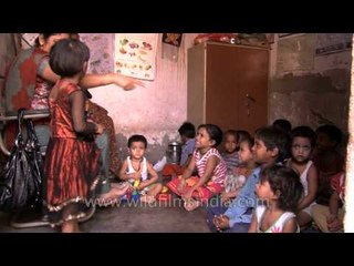 Potter's children and teacher interacting with each other