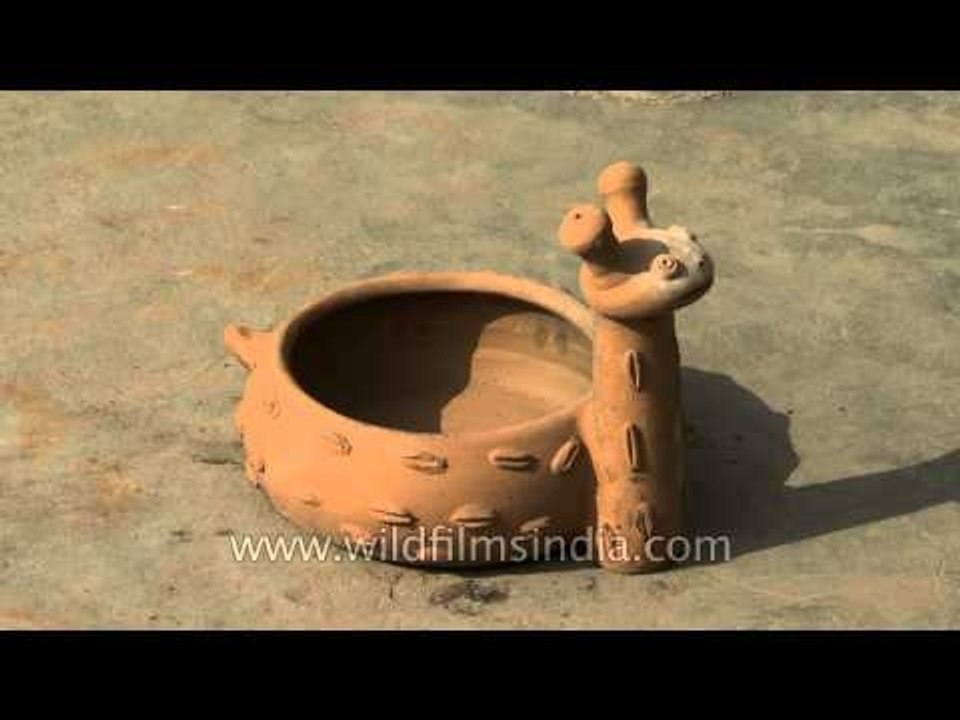 Snail made from clay and earth