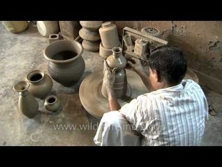 Making of pottery on potter's wheel