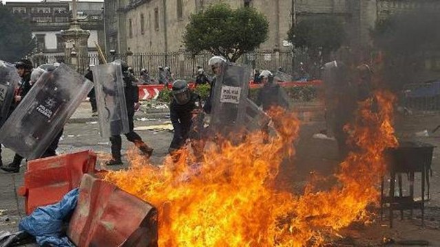 Mexico police clash with striking teachers