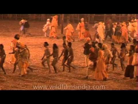Naga Sadhus leave from their camp for a dip - Kumbh Mela