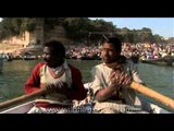 Tourists enjoying a boat ride on the Ganga at the ongoing Kumbh Mela