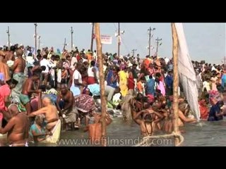 People taking holy bath at Kumbh Mela