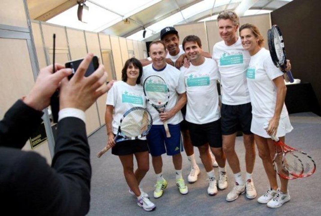 Estelle Denis et  Fabrice Santoro en double pour l'étoile de Martin