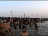 Devotees throng at the banks of river Ganga during Ardh kumbh Mela