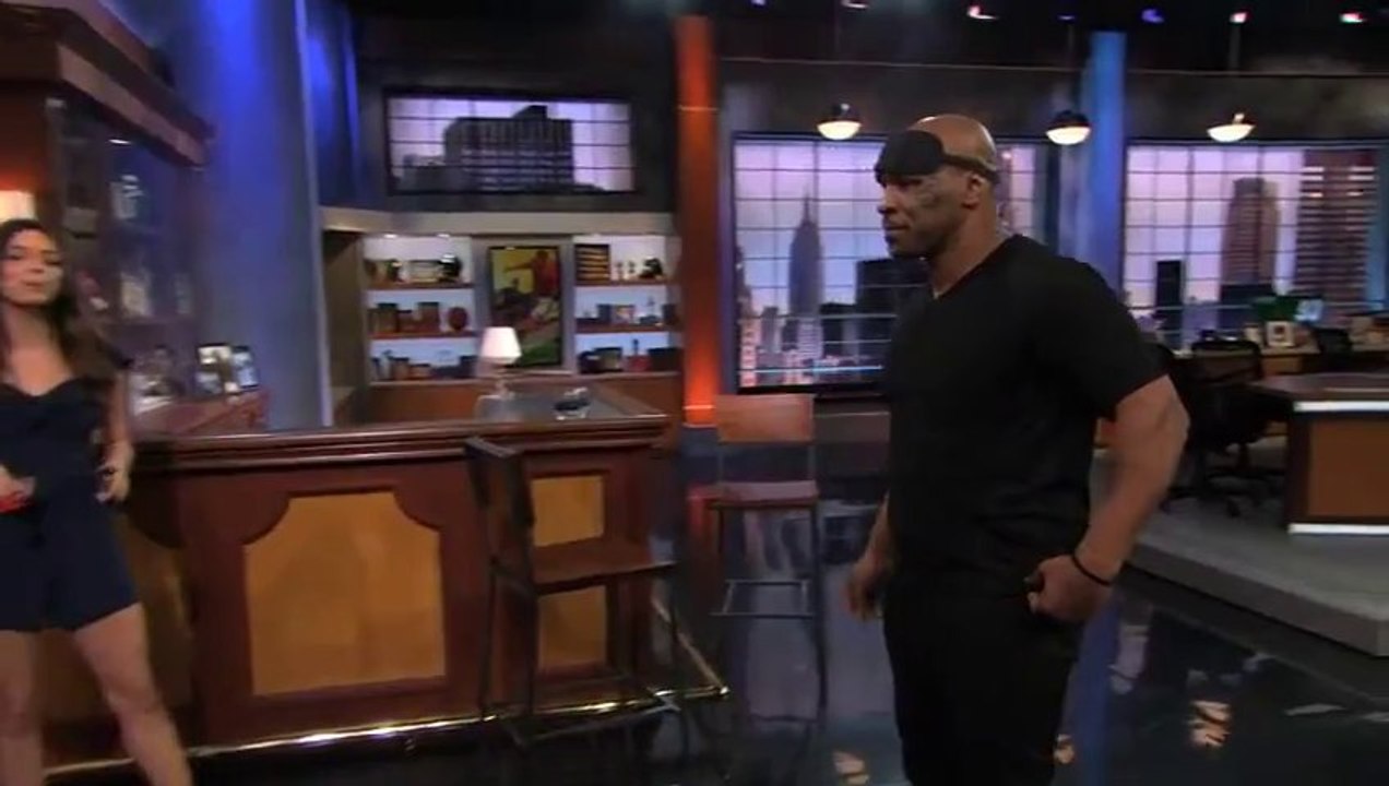 Mike Tyson Throwing Darts Blindfolded!