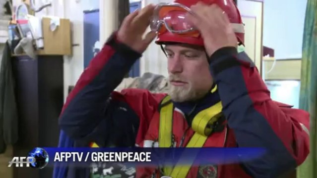 Greenpeace activists scale oil rig in Russian Arctic