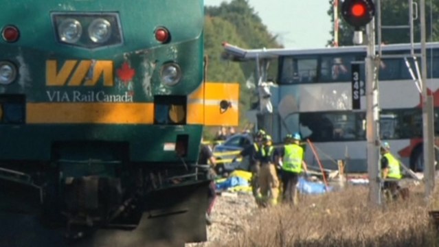 Passenger train collides with bus in Ottawa, several dead