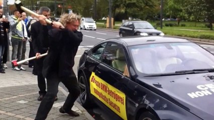 Man Smashes BMW M6 With Axe Protesting Poor Customer Service