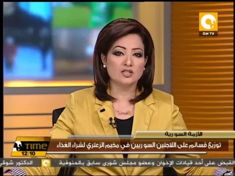 توزيع قسائم على اللاجئين السوريين في مخيم الزعتري لشراء الغذاء