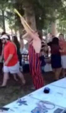 Dizzy Bat Efforts go Wrong at Football Game