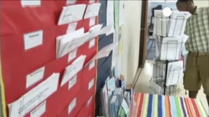 Fed surprises by staying with stimulus as it cuts growth...