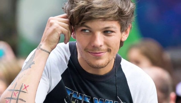 One Direction, Louis Tomlinson Falls On Stage While Performing