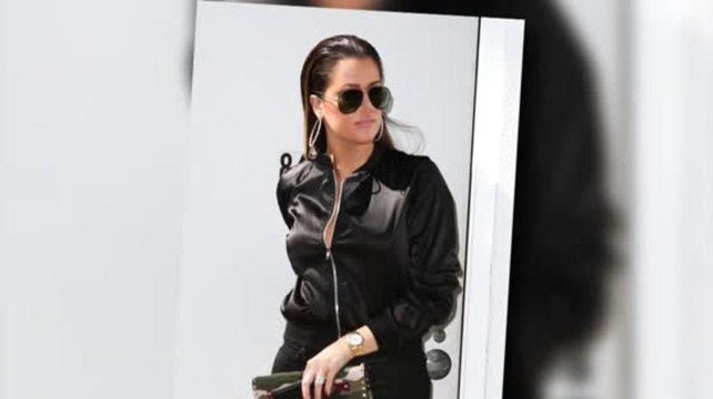 Khloe Kardashian Shows Off Her Killer Curves in a Tight All-Black Outfit
