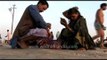 Devotees getting ready after the holy bath in Sangam, Allahabad - Ardh Kumbh Mela, 2007