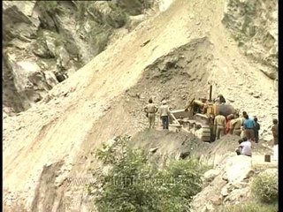 Bull-dozers hard at work to clear the road to Gangotri!