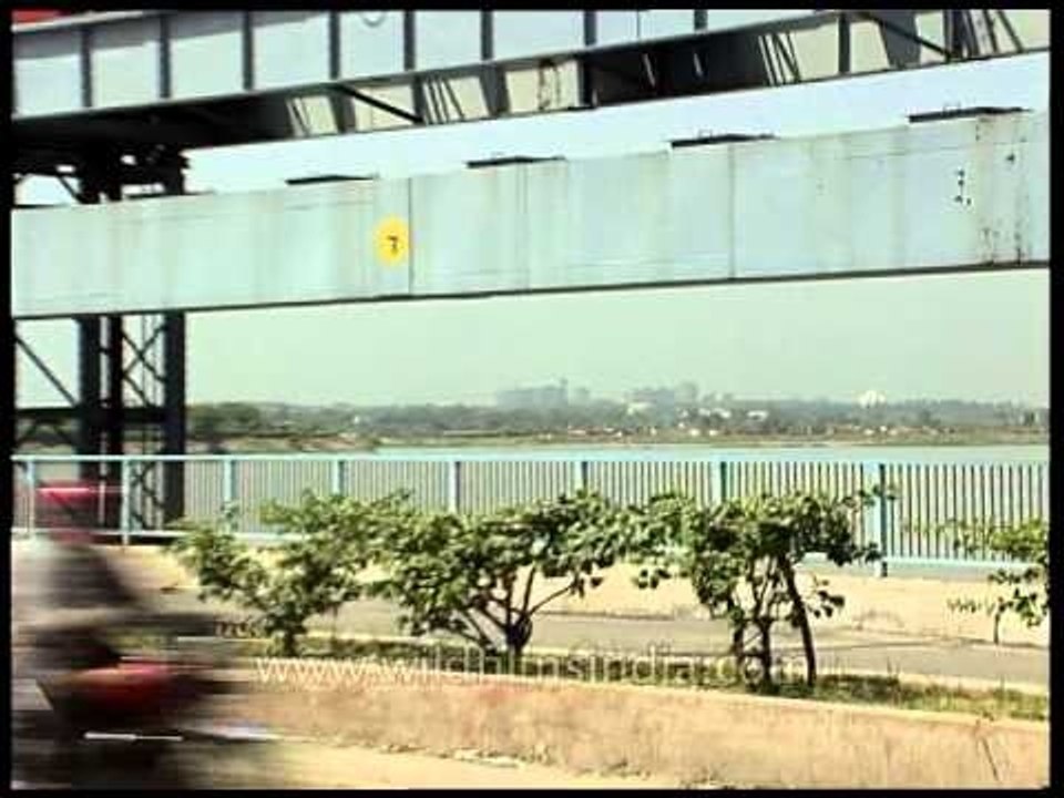 Lotus Temple and Delhi Metropolis from across t...