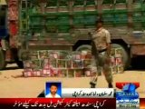 Peoples Amn Committee's truck loaded with automatic weapons & drugs seized near old sabzi mandi Karachi